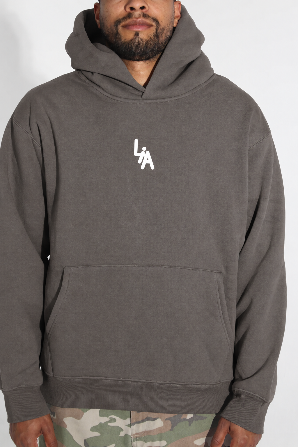 Close front pose with gray hoodie
