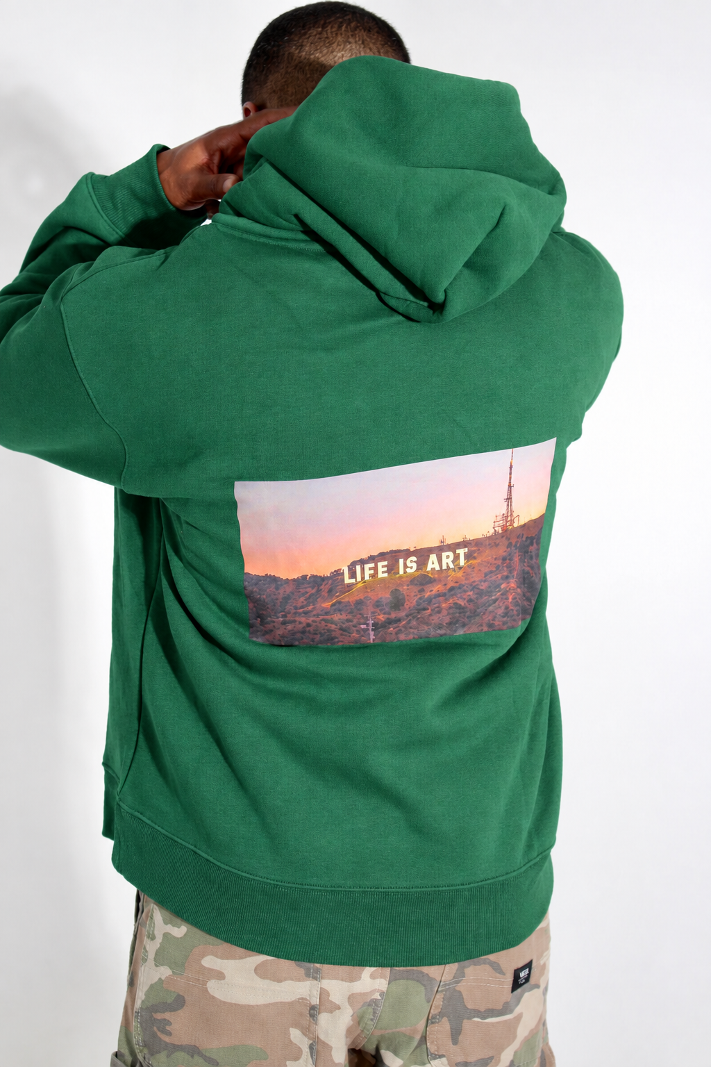 Green hoodie, back view